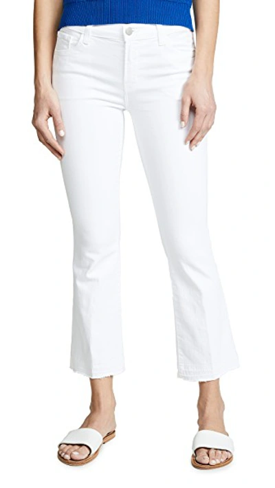 Shop J Brand Selena Mid Rise Boot Cut Jeans In Blanc