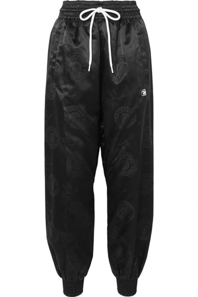 Shop Alexander Wang Satin-jacquard Track Pants In Black