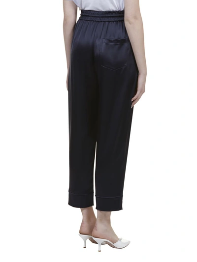 Shop Nanushka Trousers In Blu Scuro