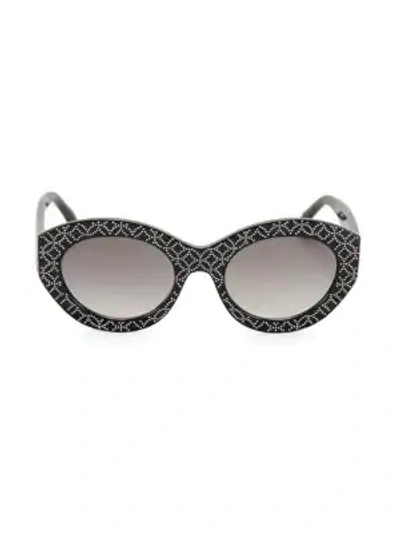 Shop Alaïa 52mm Oval Studded Sunglasses In Black