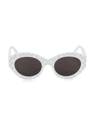 Shop Alaïa 52mm Oval Studded Sunglasses In White