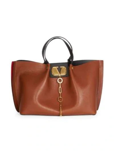 Shop Valentino Garavani Medium Vlogo Escape Leather Tote In Tan