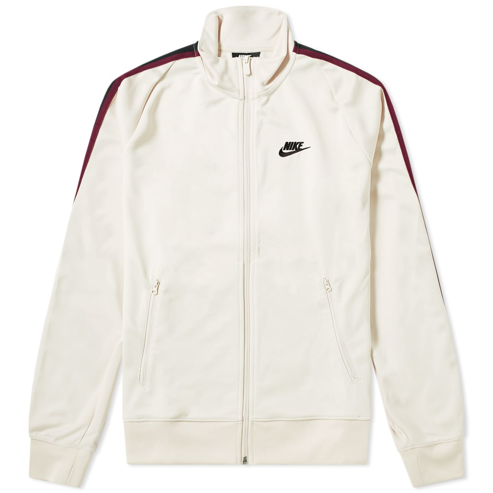 white nike track top