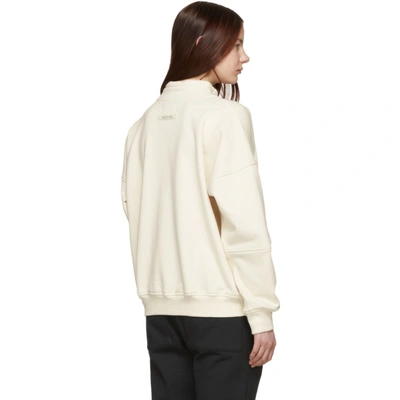 Shop Fear Of God Off-white Fg Mock Neck Pullover In 107 Cream