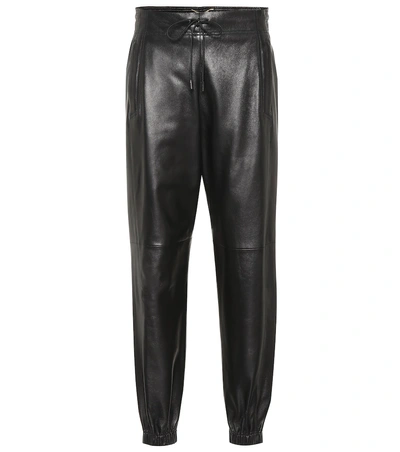 Shop Saint Laurent High-rise Leather Pants In Black
