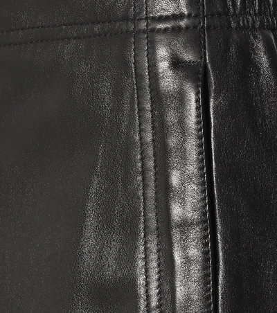 Shop Saint Laurent High-rise Leather Pants In Black