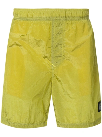 Shop Stone Island Swim Shorts - Yellow