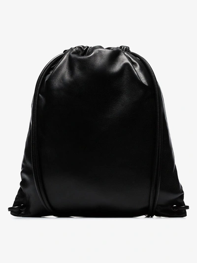 Shop Saint Laurent Black Drawstring Logo Print Leather Backpack