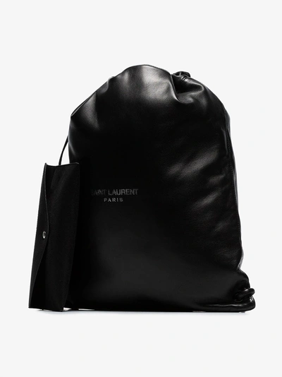 Shop Saint Laurent Black Drawstring Logo Print Leather Backpack