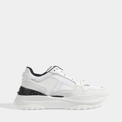 Shop Tod's | Exagerated Sole Lace Up Trainers In White Leather