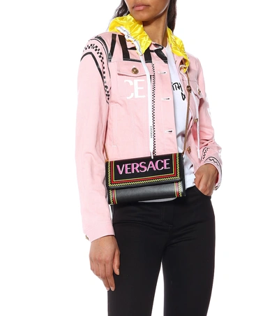 Shop Versace Printed Leather Shoulder Bag In Black