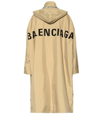 Shop Balenciaga Opera Oversized Raincoat In Beige