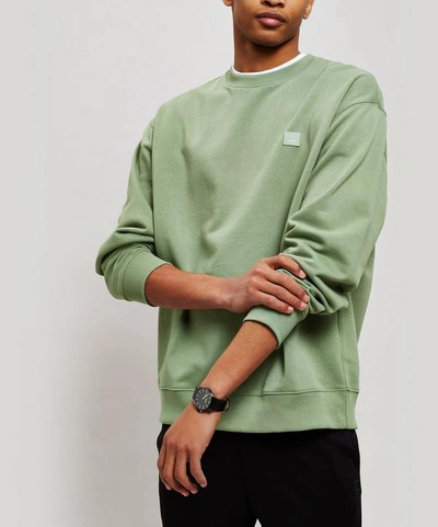 Shop Acne Studios Face Oversized Cotton Sweater In Dusty Green