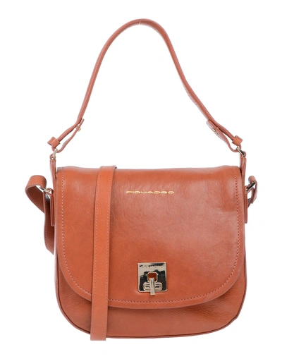 Shop Piquadro Handbags In Brown