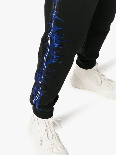 Shop Haider Ackermann Embroidered Sweatpants In 101 - Black