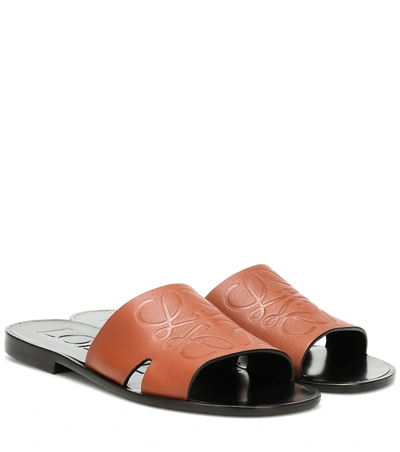 Shop Loewe Anagram Leather Slides In Brown