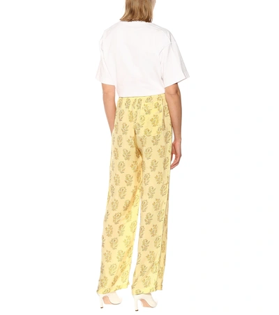 Shop Acne Studios Printed Wide-leg Pants In Yellow