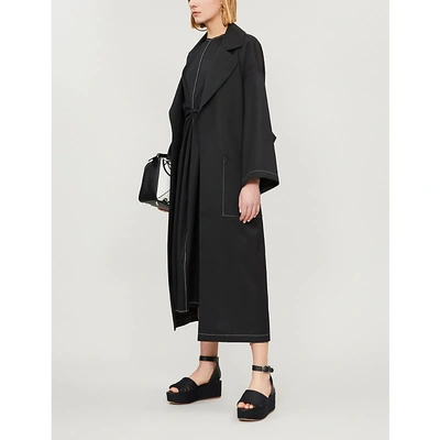 Shop Loewe Belted Oversized Woven Coat In Black