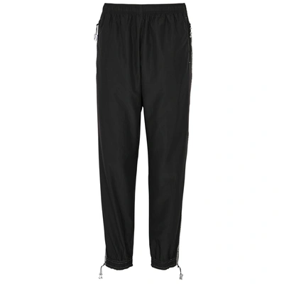 Shop Adam Selman Sport Crystal-embellished Shell Sweatpants In Black