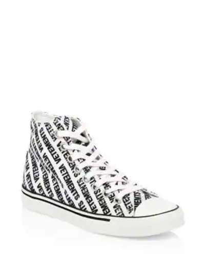 Shop Vetements Printed Canvas Sneakers In White Black