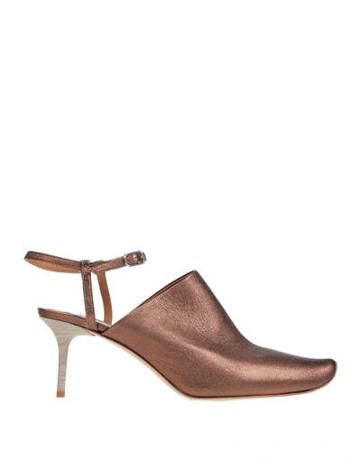 Shop Acne Studios Mules In Bronze