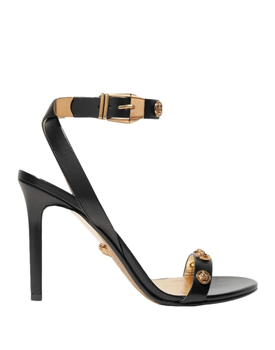 Shop Versace Sandals In Black