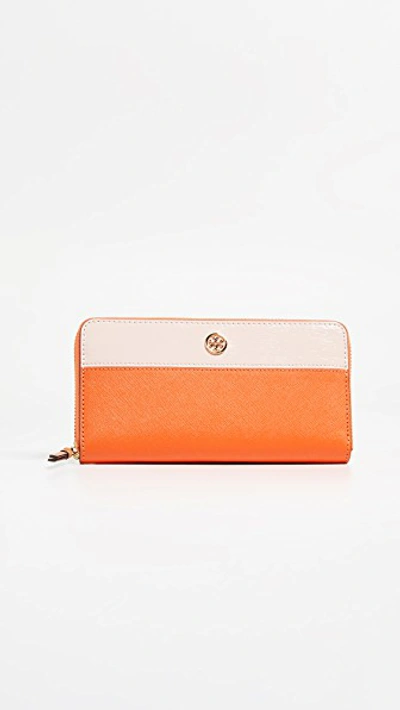 Shop Tory Burch Robinson Colorblock Zip Continental Wallet In Orange Juice / Shell Pink