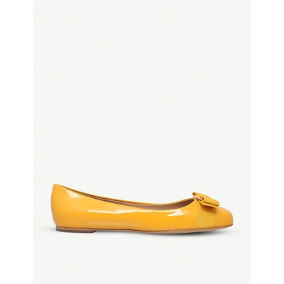 Shop Ferragamo Varina Patent-leather Ballet Flats In Yellow