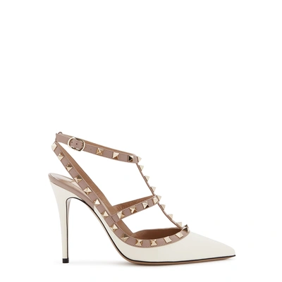 Shop Valentino Rockstud 100 Studded Leather Pumps In Ivory