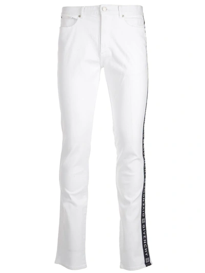 Shop Givenchy Logo Band Jeans In White