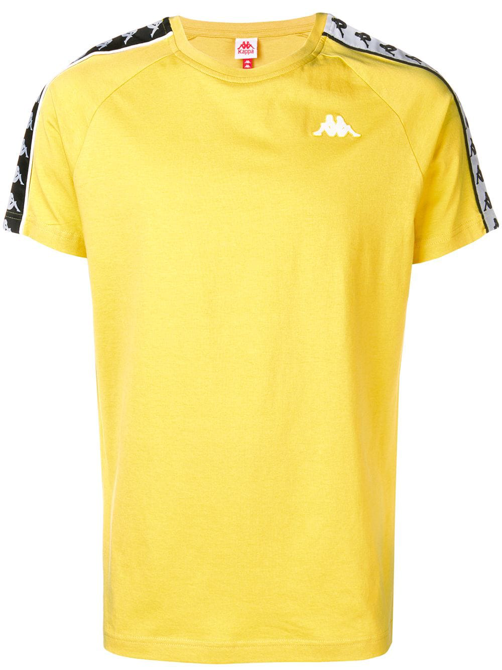 yellow kappa track pants