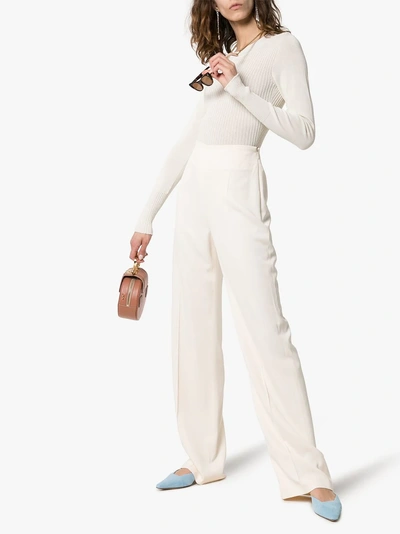 Shop Jacquemus Long-sleeved Ribbed Bodysuit In 109 - Neutrals