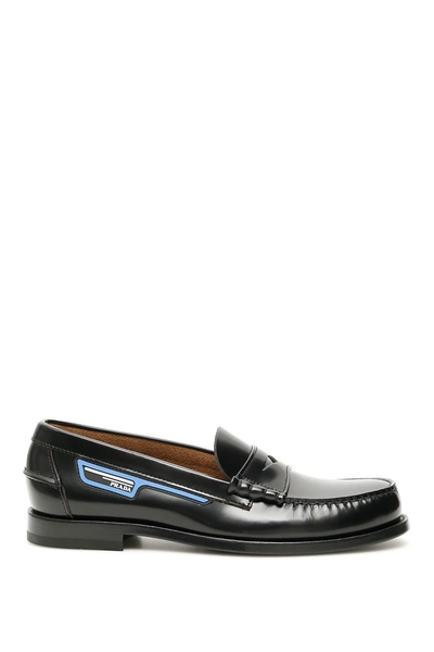 Shop Prada Logo Loafers In Nero Voyage (black)