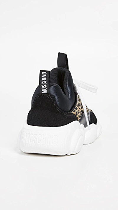 Shop Moschino Trainer Sneakers In Black/cheetah