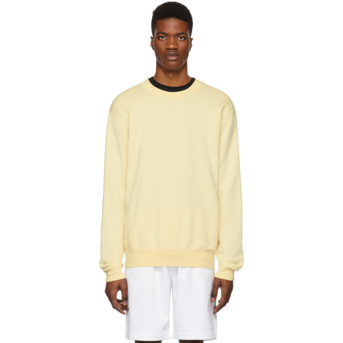 light yellow crew neck sweatshirt