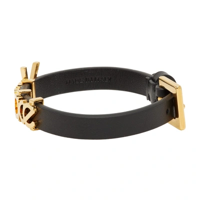 Shop Versace Black And Gold Leather Vintage Logo Bracelet In D41oh Gold