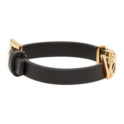 Shop Versace Black And Gold Leather Vintage Logo Bracelet In D41oh Gold