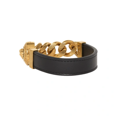 Shop Versace Black And Gold Leather Medusa Bracelet In K41t Go/blk
