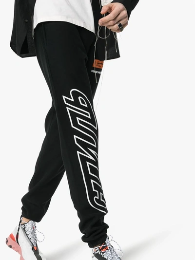 Shop Heron Preston Logo Printed Track Pants In Black