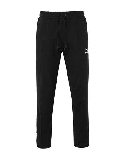 Shop Puma Pants In Black