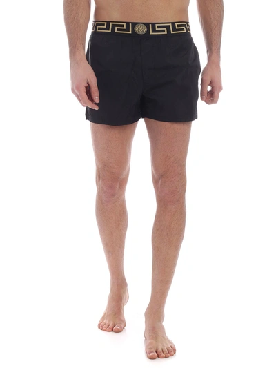 Shop Versace Border Swim Shorts In Black