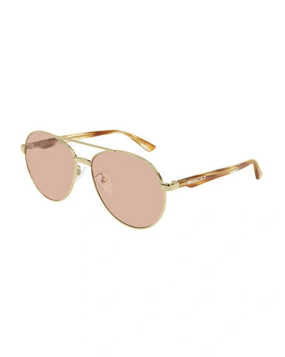 Shop Balenciaga Round Metal Sunglasses In Gold