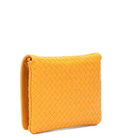 Shop Bottega Veneta Intrecciato Leather Crossbody Bag In Yellow