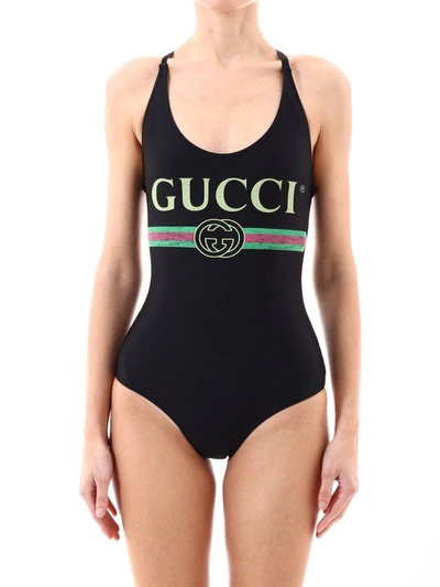 Shop Gucci Logo Printed Swimsuit In Black