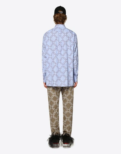 Shop Valentino Uomo Oversized Shirt With Vltn Grid Print Man Light Blue Cotton 100% 40