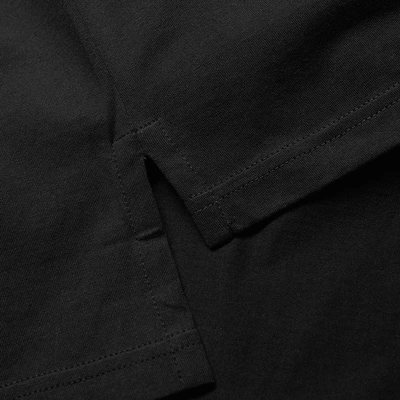 Shop Givenchy Tape Detail Polo In Black