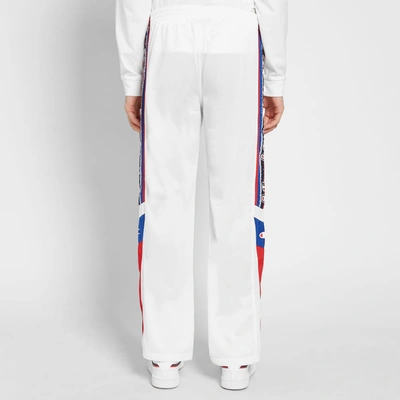 Shop Champion Reverse Weave Taped Track Pant In White