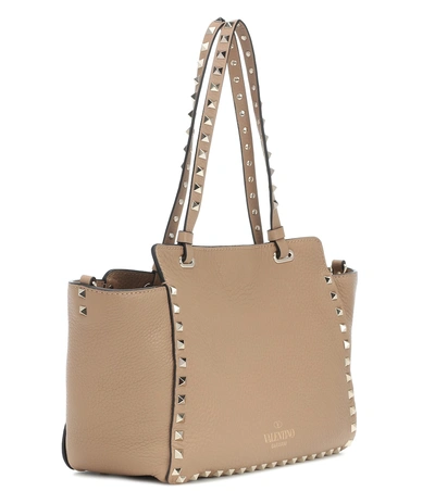 Shop Valentino Rockstud Small Leather Tote In Beige