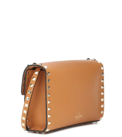 Shop Valentino Rockstud Small Leather Shoulder Bag In Brown