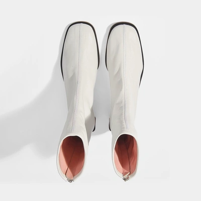 Shop Acne Studios | Bertine Soft Mid Height Ankle Boots In White Lamb Leather